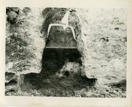 Hole being dug to hold an anchor for a tower antenna.
