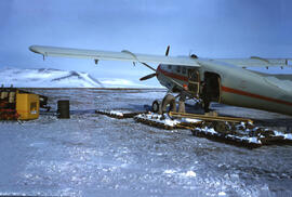 Beaver Aircraft being loaded with supplies. Isachsen.
